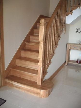 Concrete stairs wrapped in white oak