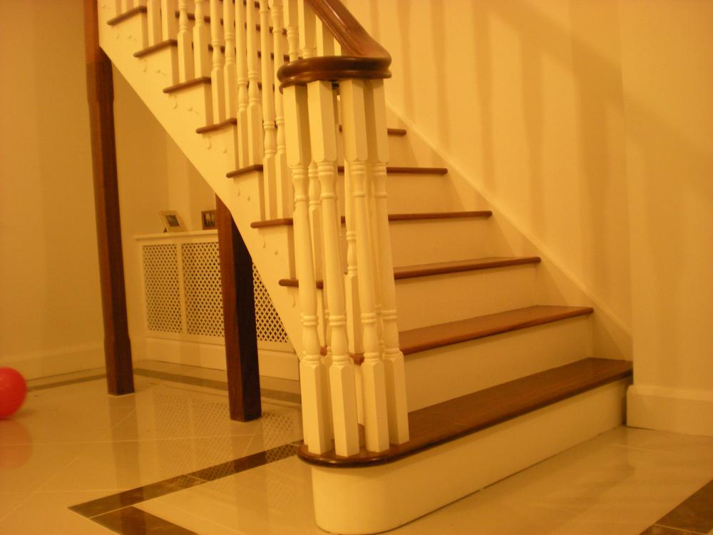 Flared Mahogany and Painted Stairs