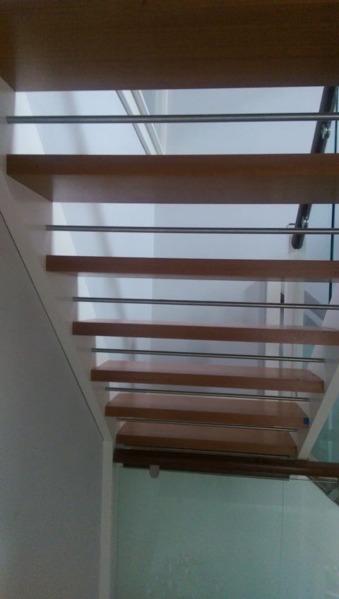 Mahogany and red deal open rise with steel safety bars