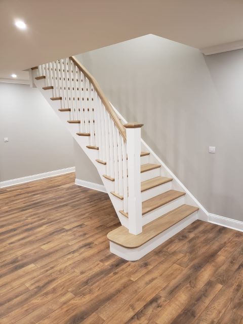 White Oak and Red Deal Flared Cut String Stairs